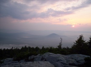 A pale pink and purple sunset from atop Mount Cube