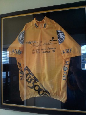 A signed Tyler Hamilton Tour of Missouri jersey; written across it are "Olympic Gold Medalist" and "US Pro Champion '08"